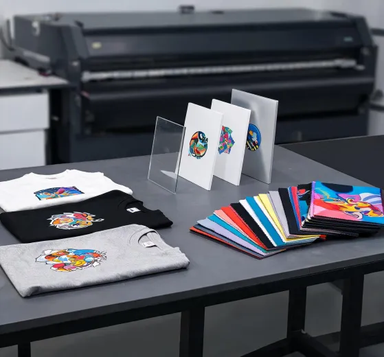 Printed apparel and rigid samples arranged for comparison